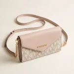Cartera Michael Kors sobre crossbody rosa palo