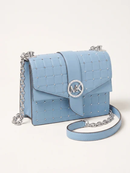 Cartera Michael Kors celeste con tachas