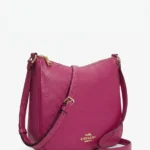 Cartera Coach hobo fucsia de cuero granulado con logo del carruaje