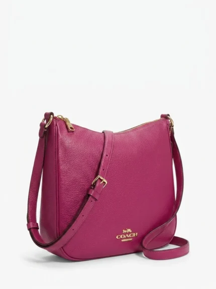 Cartera Coach hobo fucsia de cuero granulado con logo del carruaje