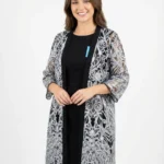 Vestido Negro con Cárdigan de Encaje — foto 1